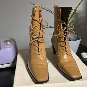 Women’s tie up, healed, boot, caramel color. Leather upper